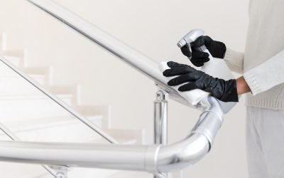 hands-with-gloves-disinfecting-hand-rail hands-with-gloves-disinfecting-hand-rail
